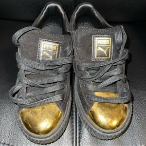 Puma Sneakers in Black/Gold